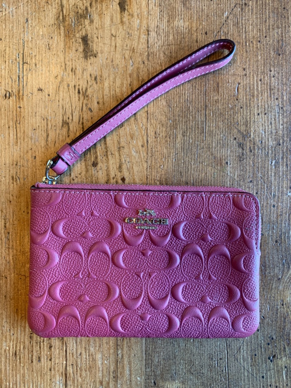 COACH Raspberry Pink Embossed Signature Wristlet